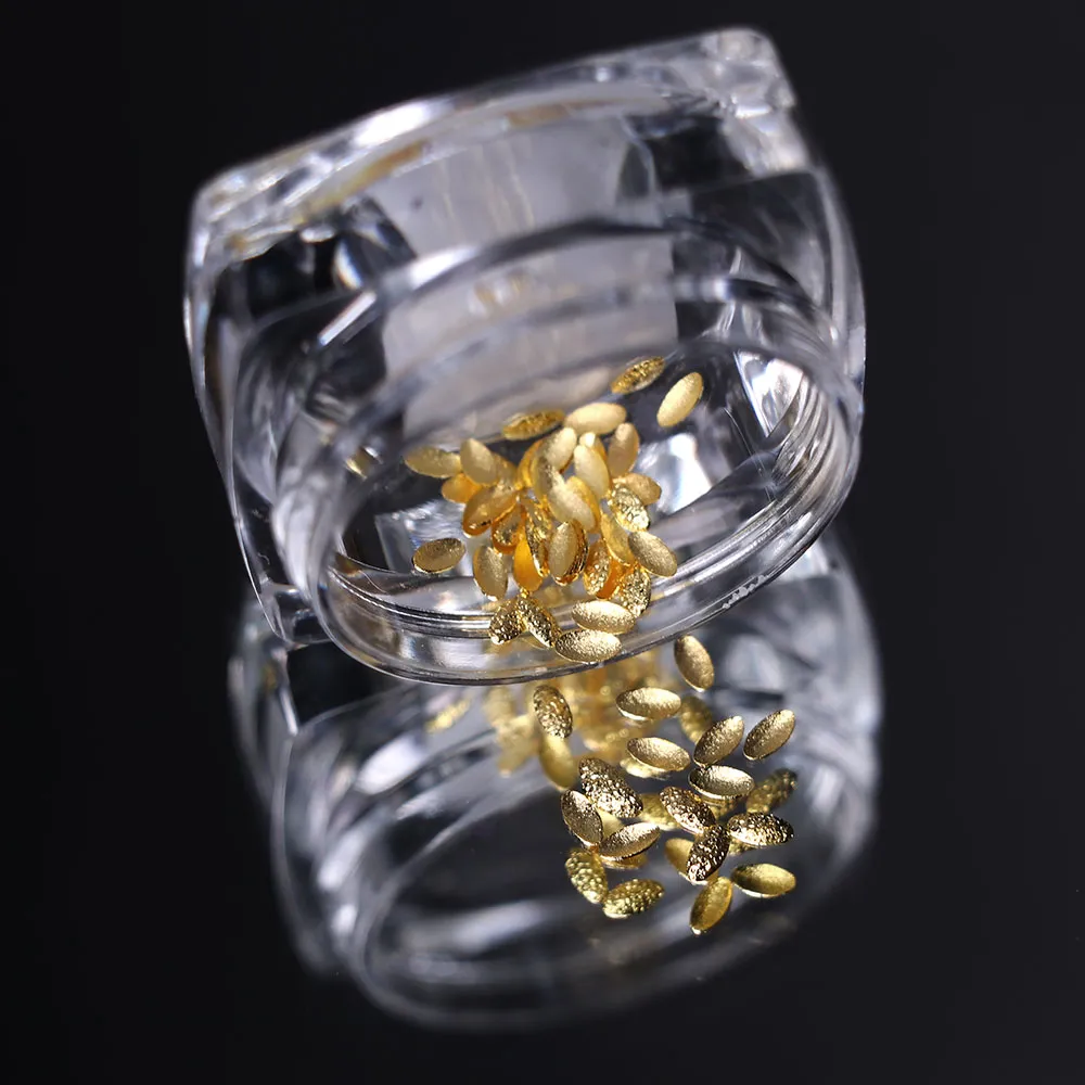 Komilfo Texture Rivets borchie ovali oro 1,5x3 mm 50 pz