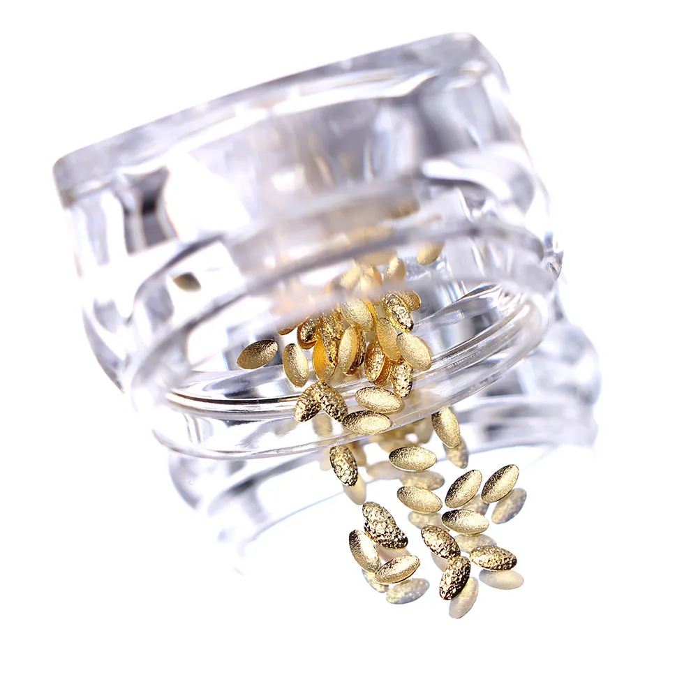 Komilfo Texture Rivets borchie ovali oro 1,5x3 mm 50 pz