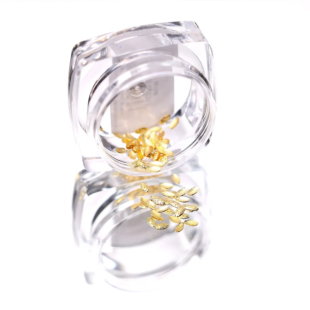 Komilfo Texture Rivets borchie ovali oro 1,5x3 mm 50 pz